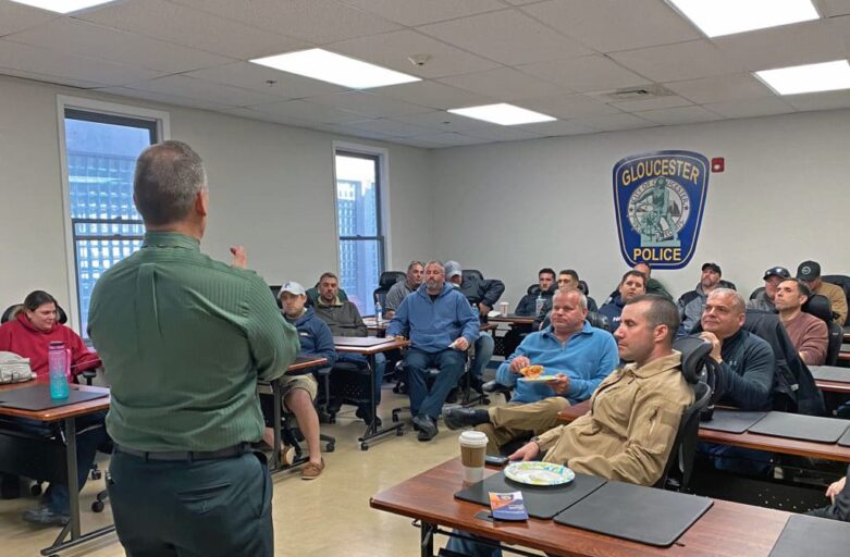 Scott Allen of Operation 2 Save Lives and QRT National speaks with Gloucester Police officers during a training session. (Photo Courtesy City of Gloucester)